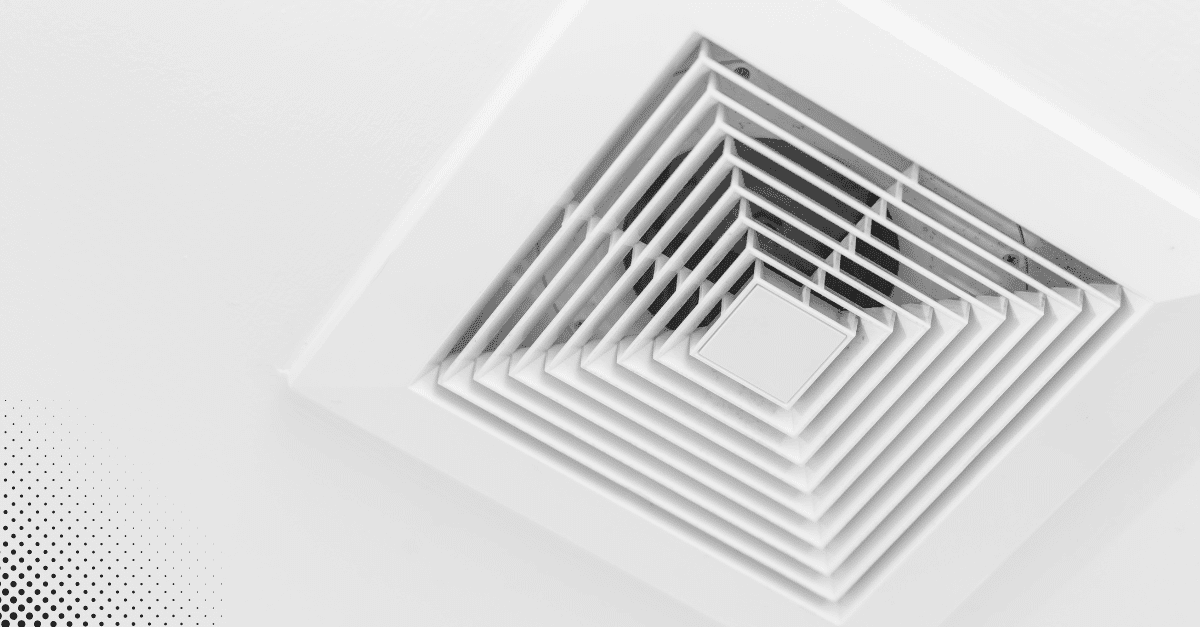 Close-up of an HVAC air vent installed in the ceiling.