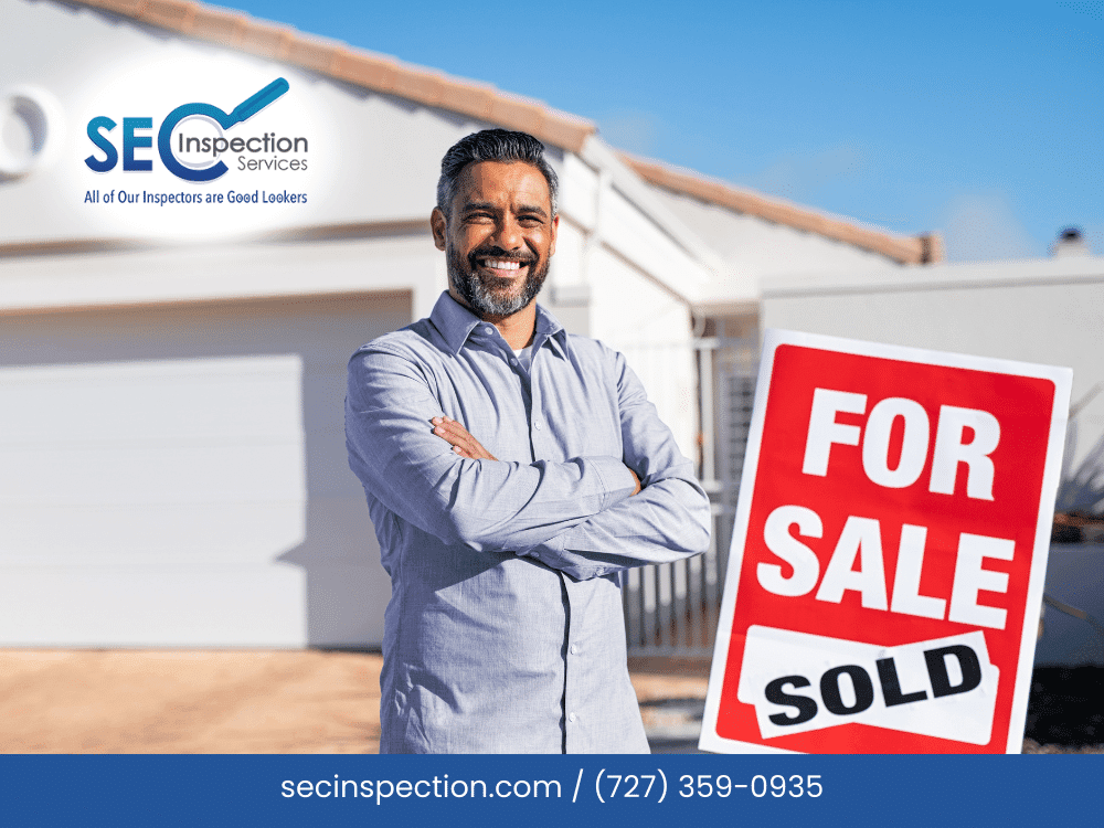 Professional home inspector in front of a 'For Sale' sign, offering inspection services