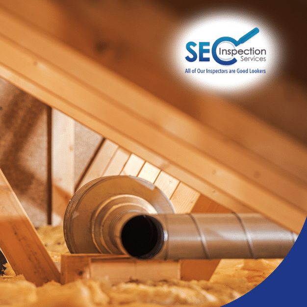 Home inspector examining attic insulation and ductwork during a residential inspection.